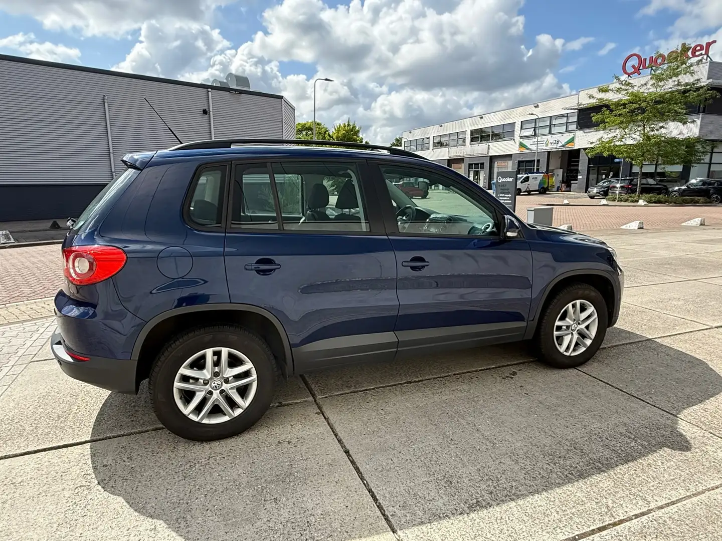 Volkswagen Tiguan 1.4 TSI Comfort&Design 4Motion Volledig onderhoude Blauw - 2