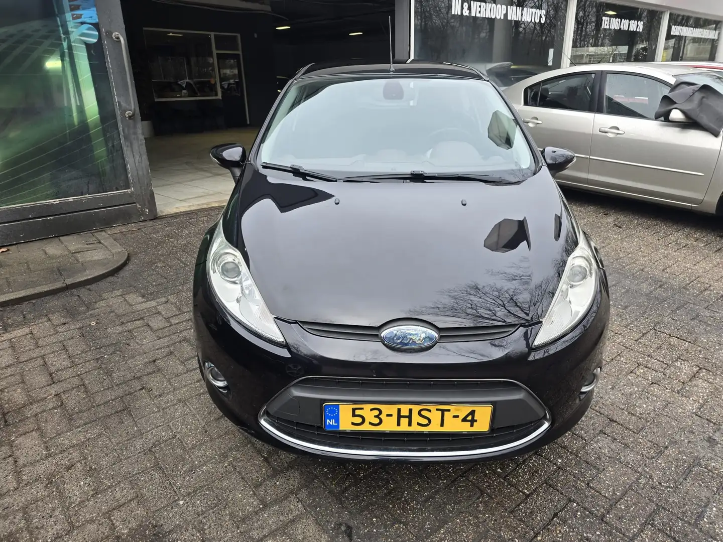 Ford Fiesta 1.25 Titanium | NW APK | 12MND GARANTIE | AIRCO | Schwarz - 2