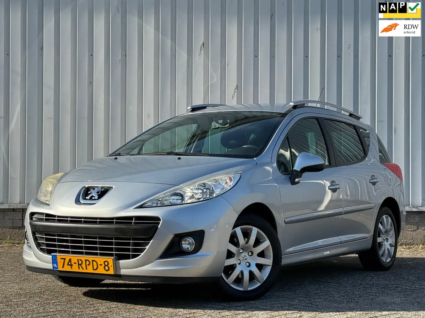 Peugeot 207 SW 1.6 VTi Sportium 2e Eigenaar,Trekhaak,Airco,Cru Grijs - 1