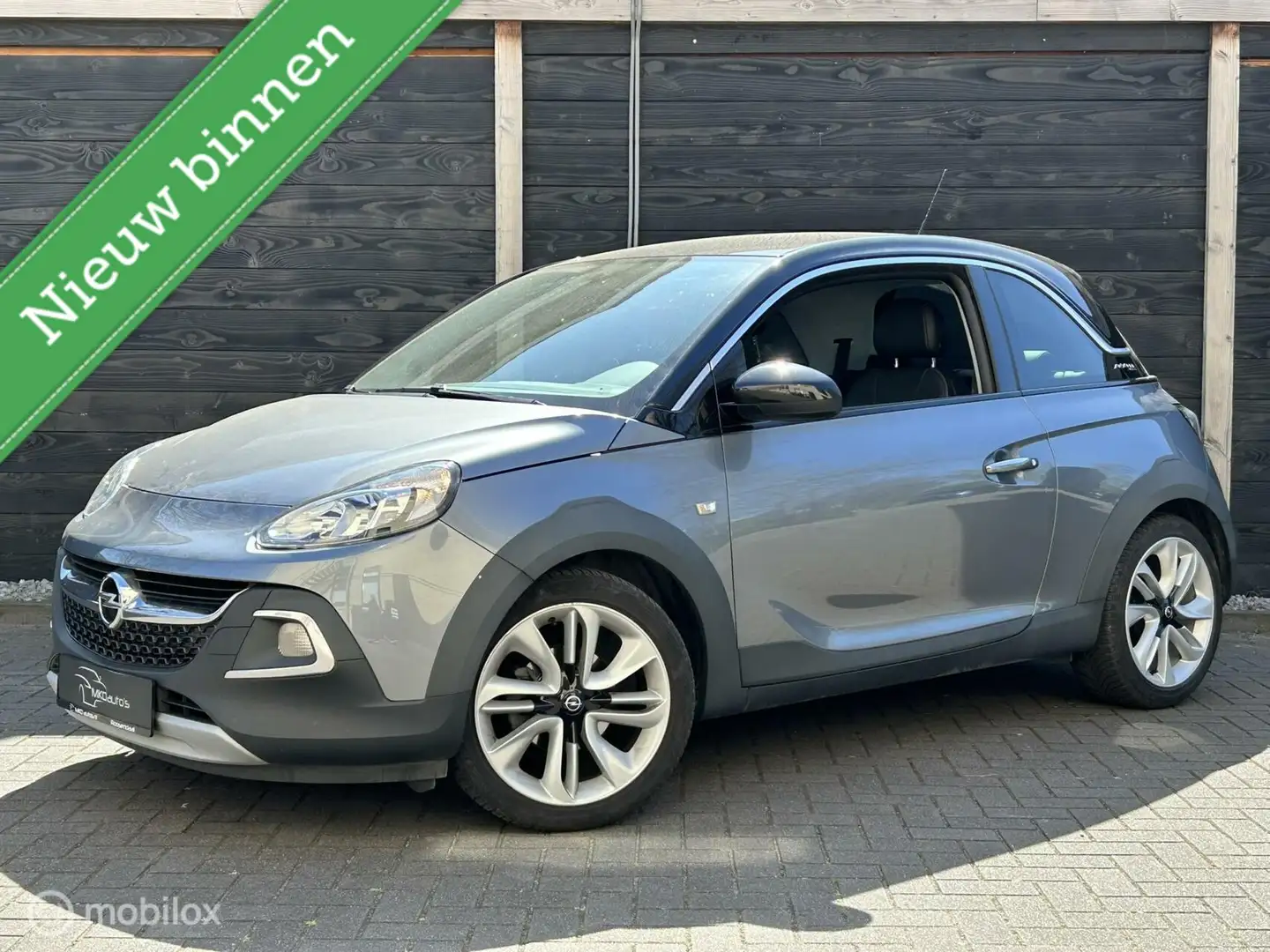 Opel Adam 1.2i Rocks uitvoering / half leder / airco / 17" L Gris - 1