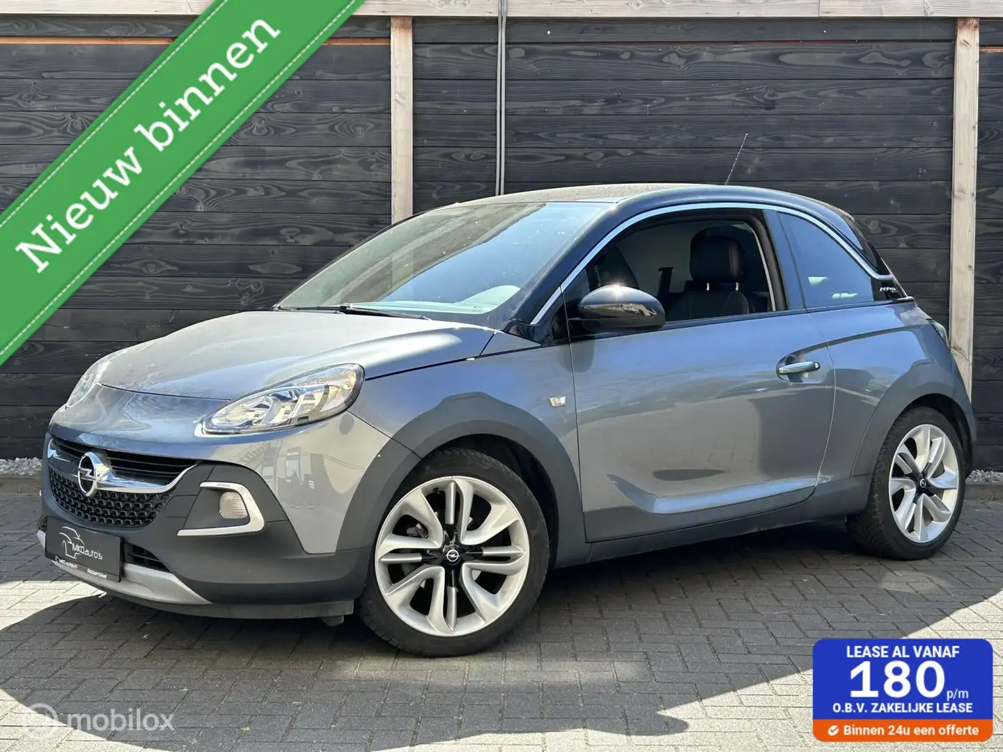 Opel Adam 1.2i Rocks uitvoering / half leder / airco / 17" L Gris - 1