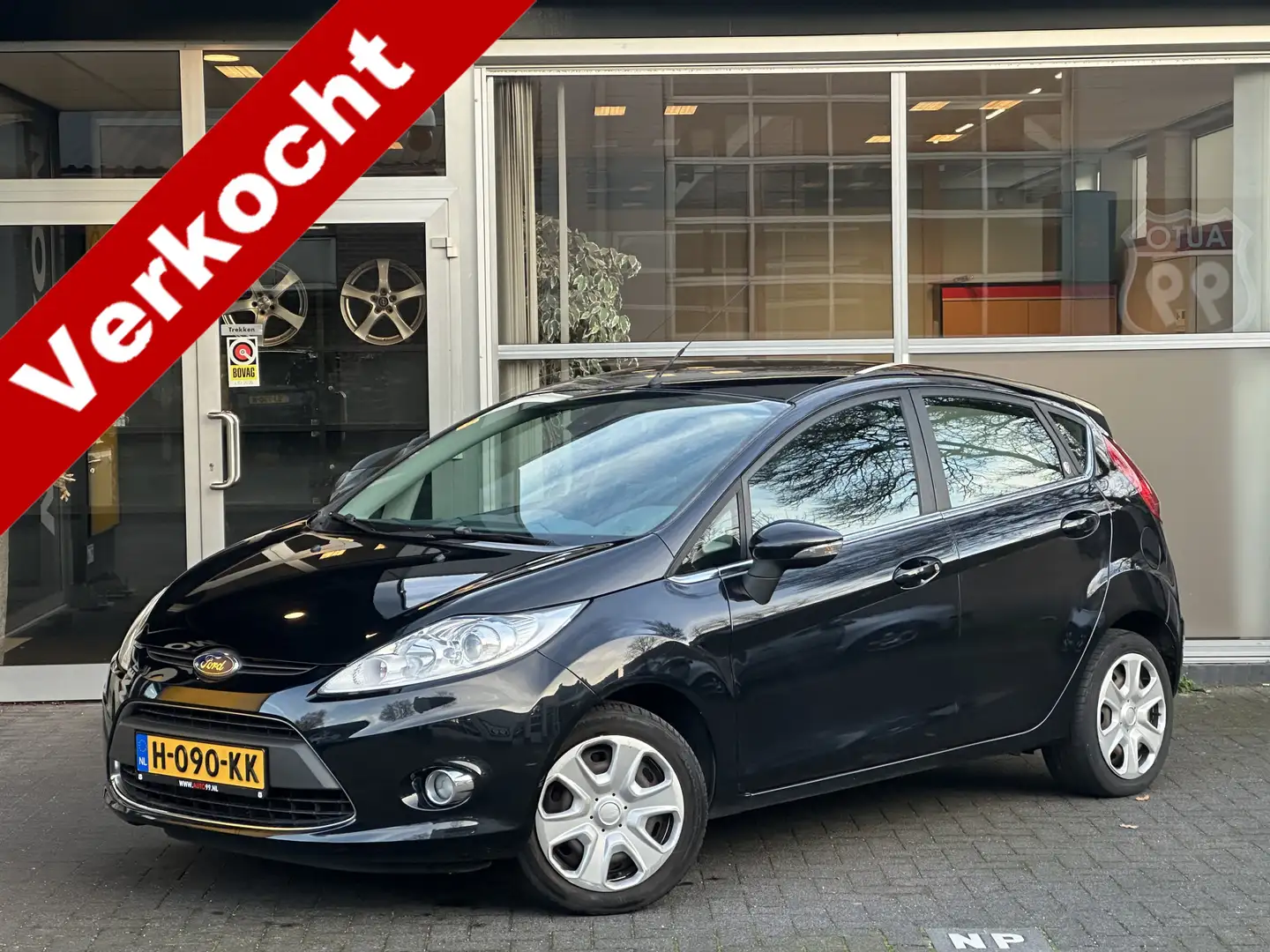 Ford Fiesta 1.4 Ghia CLIMA / BLUETOOTH / ELEKT RAMEN / ELEKT V Schwarz - 1