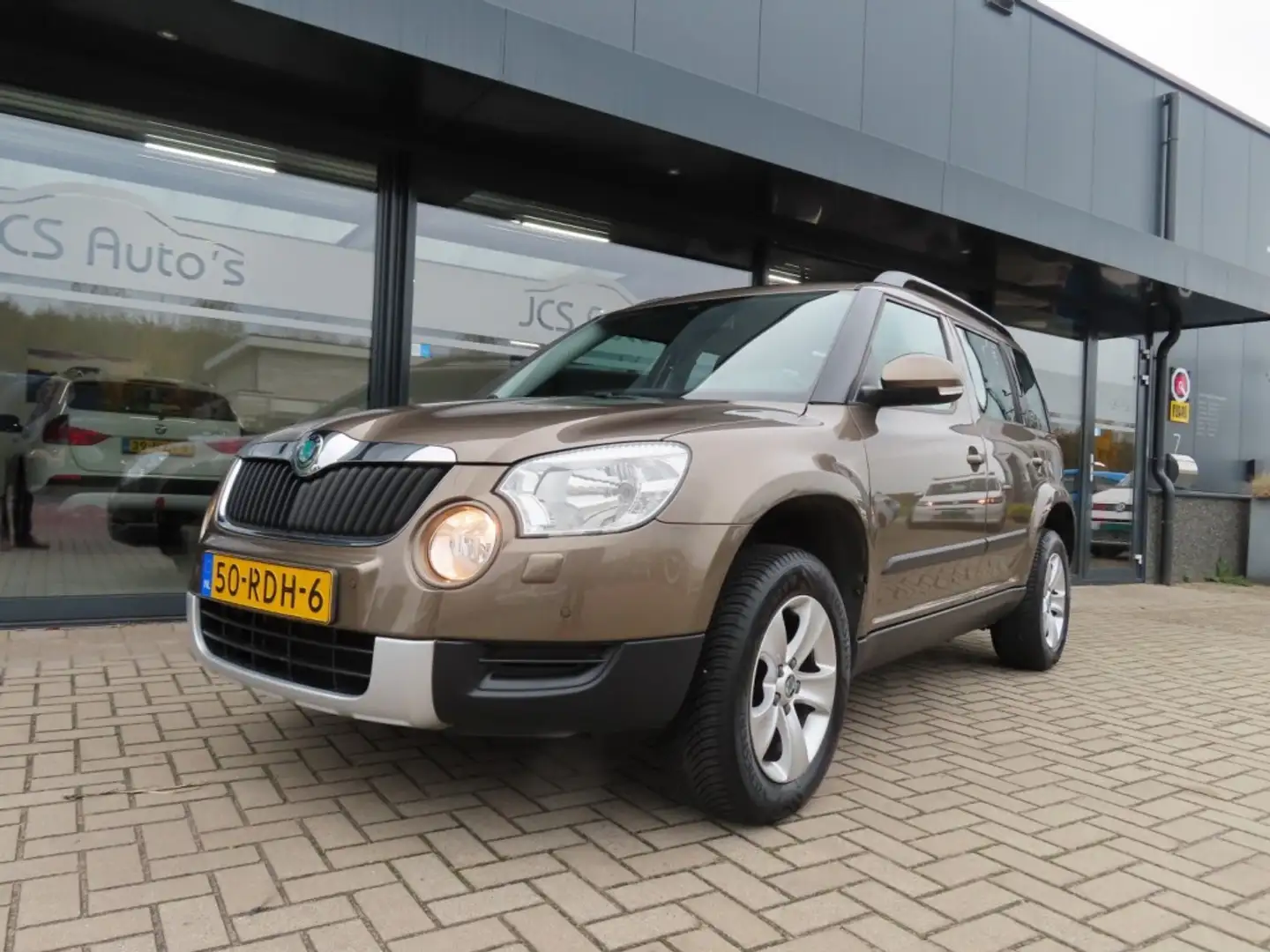 Skoda Yeti 1.4 TSI Ambition Ecc Cruise Trekhaak 2x Pdc 2011 Bruin - 1