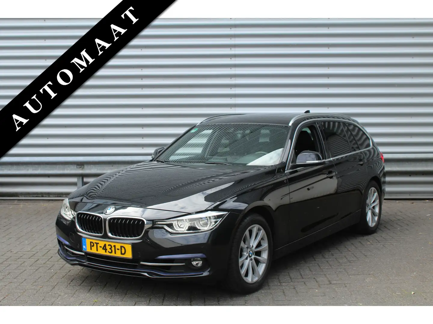 BMW 320 3-serie Touring 320i 184pk High Executive Automaat Zwart - 1