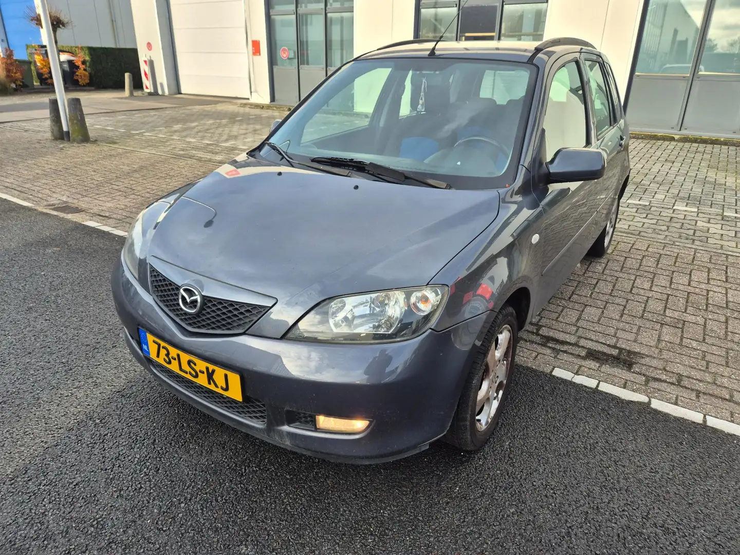 Mazda 2 1.4i Touring 5drs Airco Nap Apk 04-26 Grigio - 1