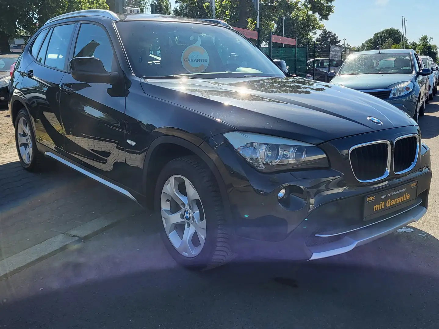 BMW X1 18 d sDrive 1Hand Navi Xenon 12 Monate Garantie Schwarz - 1