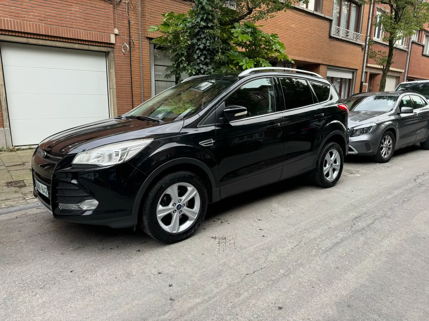 Ford Kuga 1.6 EcoBoost 2WD Champions Plus Edition S/S Zwart - 1