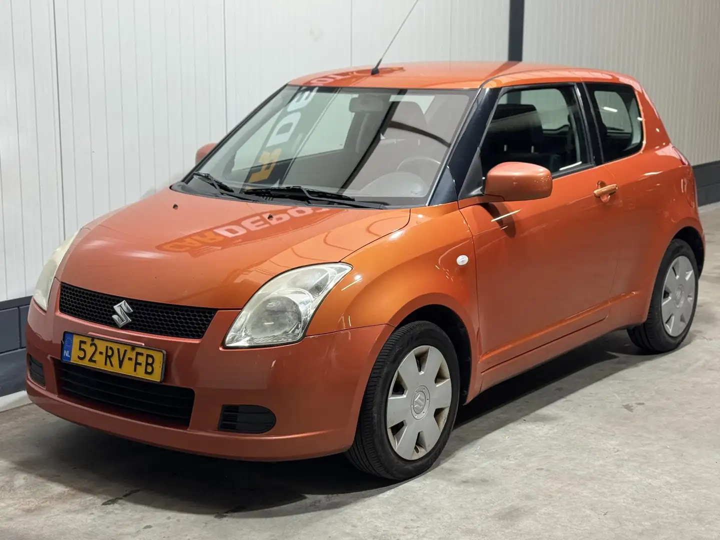 Suzuki Swift 1.3 GLS Oranje - 1