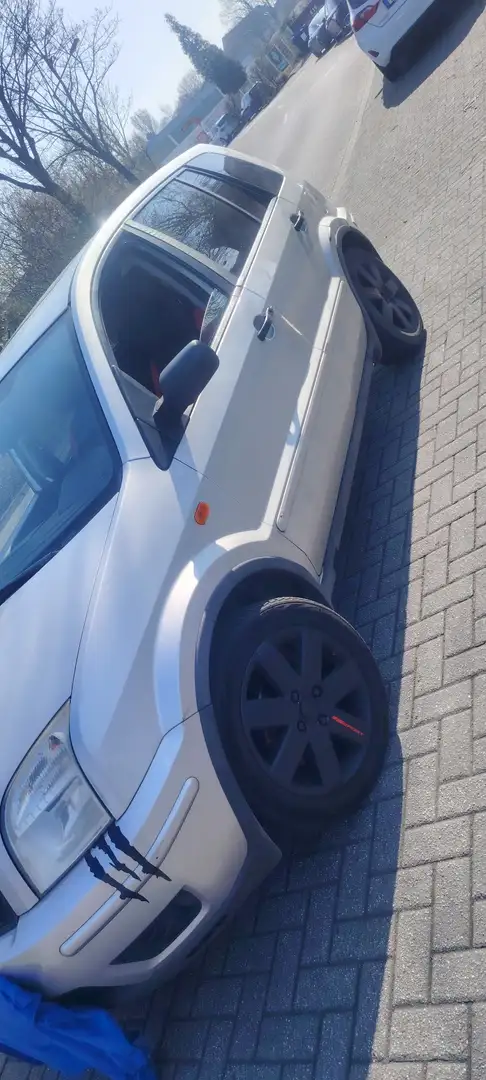 Ford Fusion 1.4 + - 2