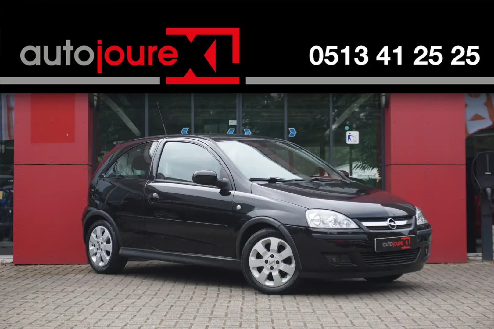 Opel Corsa 1.4-16V Sport | Origineel NL | Radio | Xenon | Lic Zwart - 1