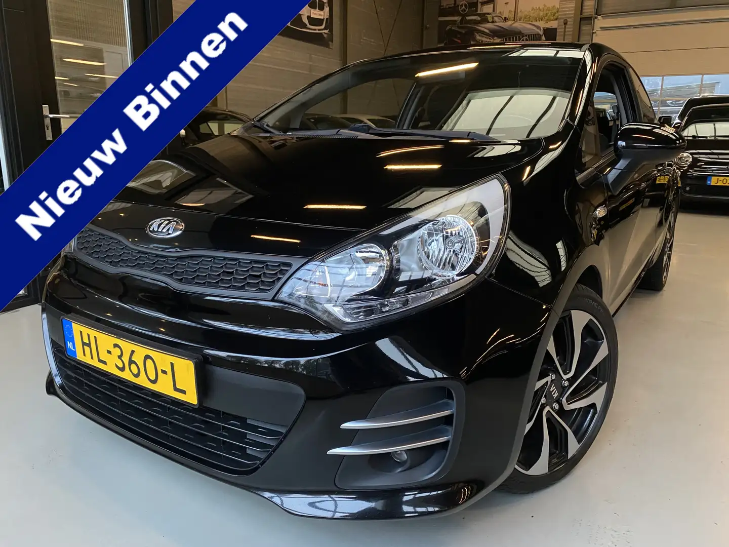 Kia Rio 1.2 CVVT ComfortLine Airco, Cruise, 17inch Zwart - 1