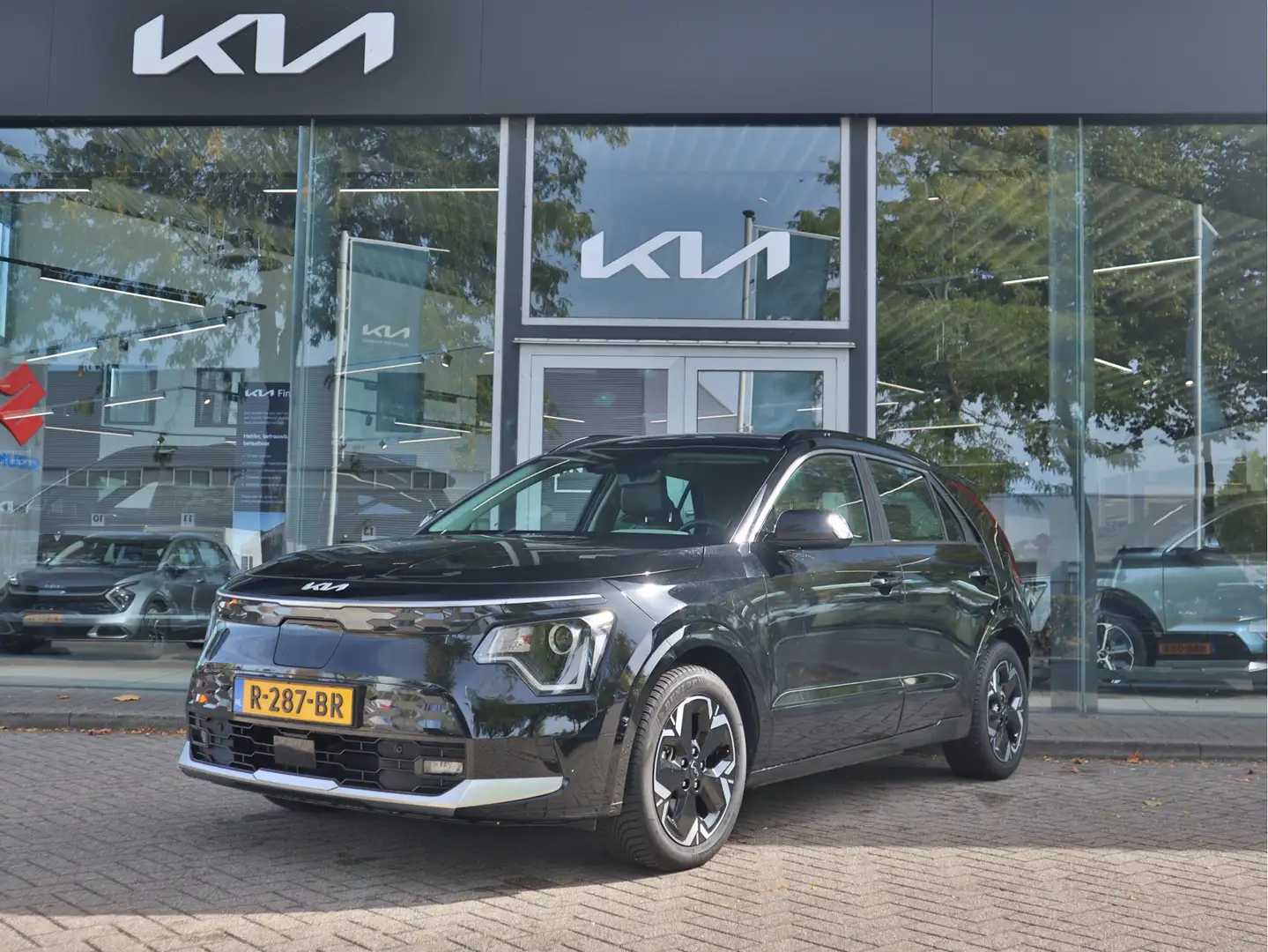 Kia e-Niro EV DynamicLine 64.8 kWh | Navigatie | Stoelverwarm Noir - 1