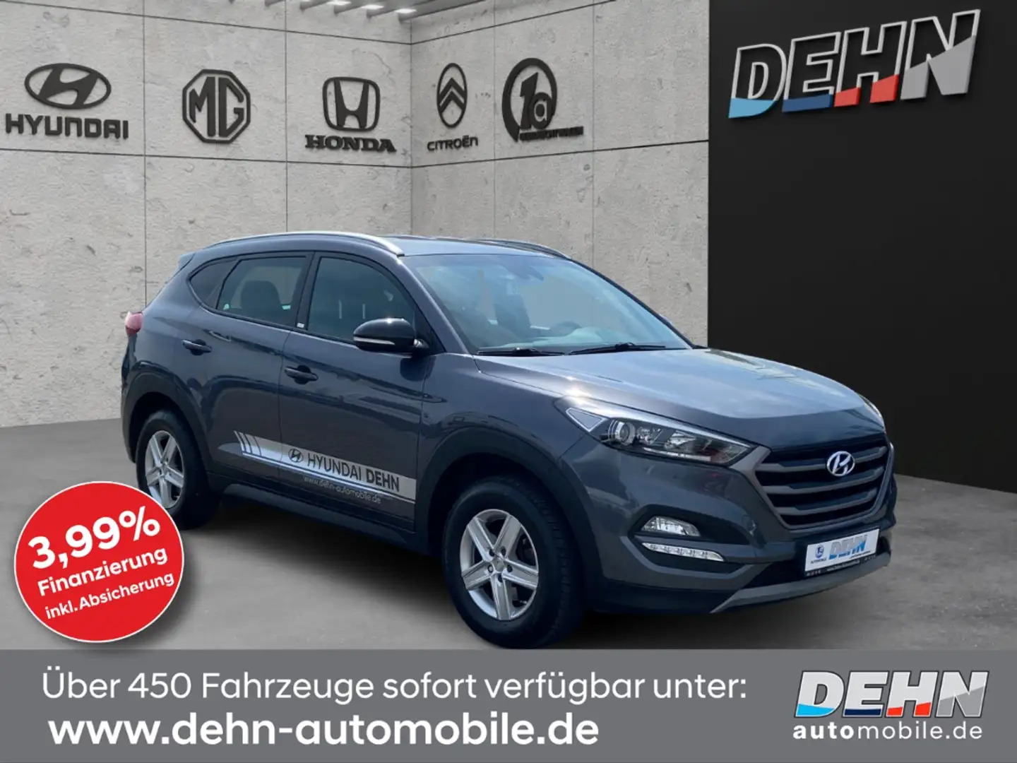 Hyundai TUCSON 1.6 GDi blue Passion AHK Navi Kamera Grijs - 1