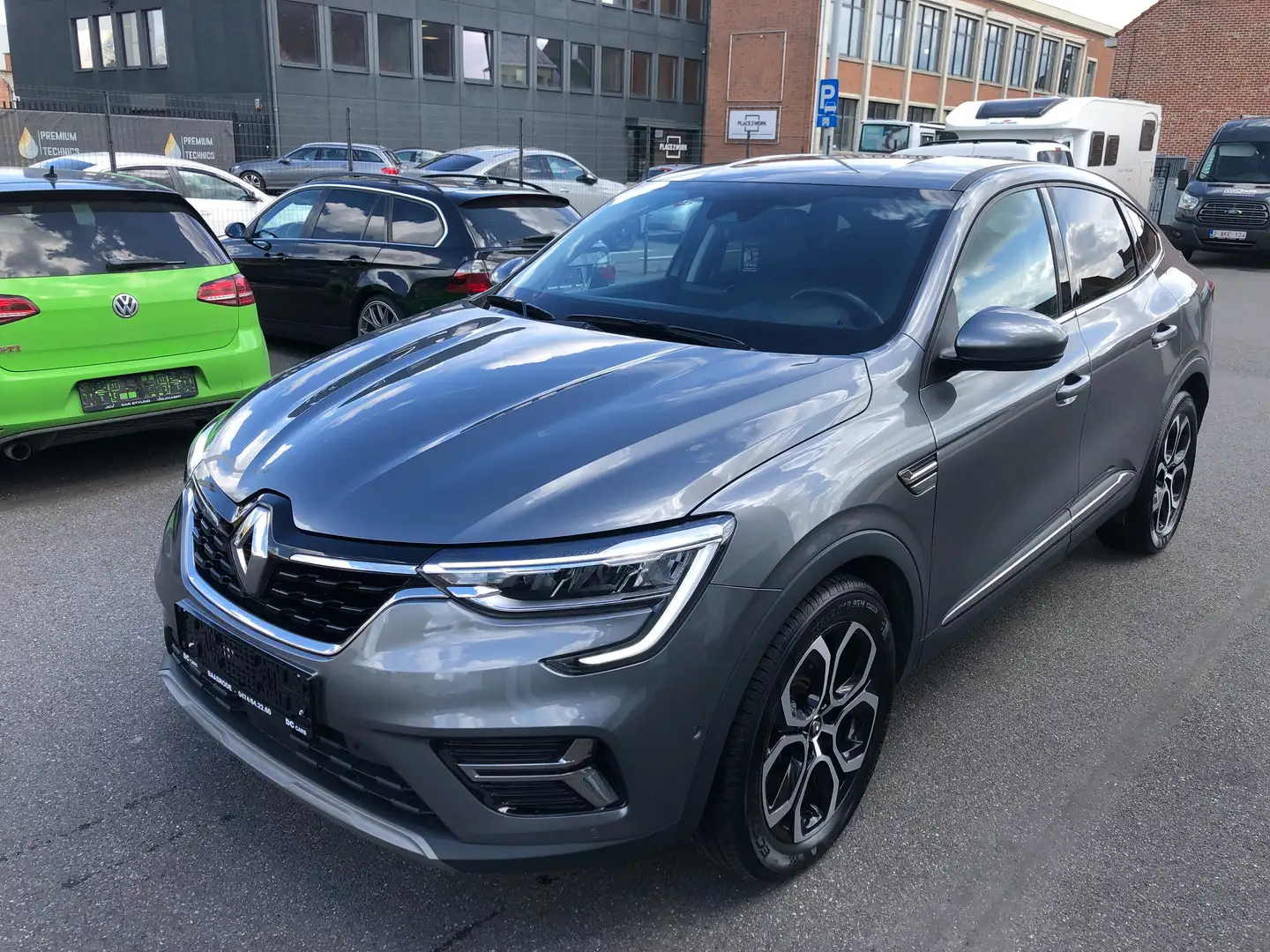 Renault Arkana 1.6i E-TECH HEV Intens Grijs - 1