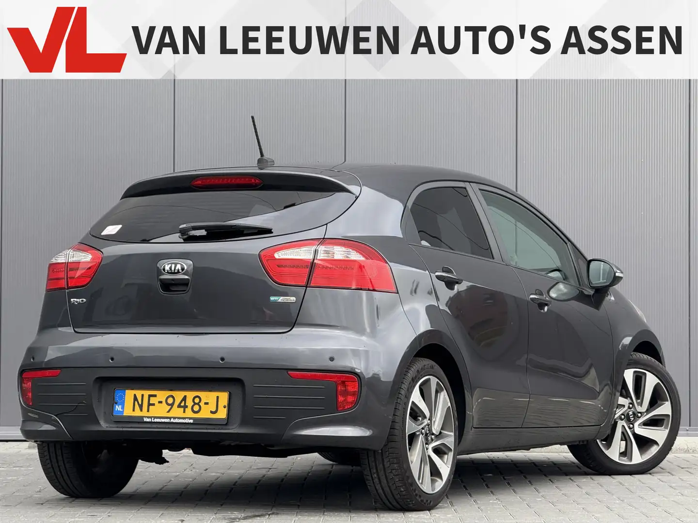 Kia Rio 1.2 CVVT ExecutiveLine | Rijklaar | Navi | PDC | Gris - 2