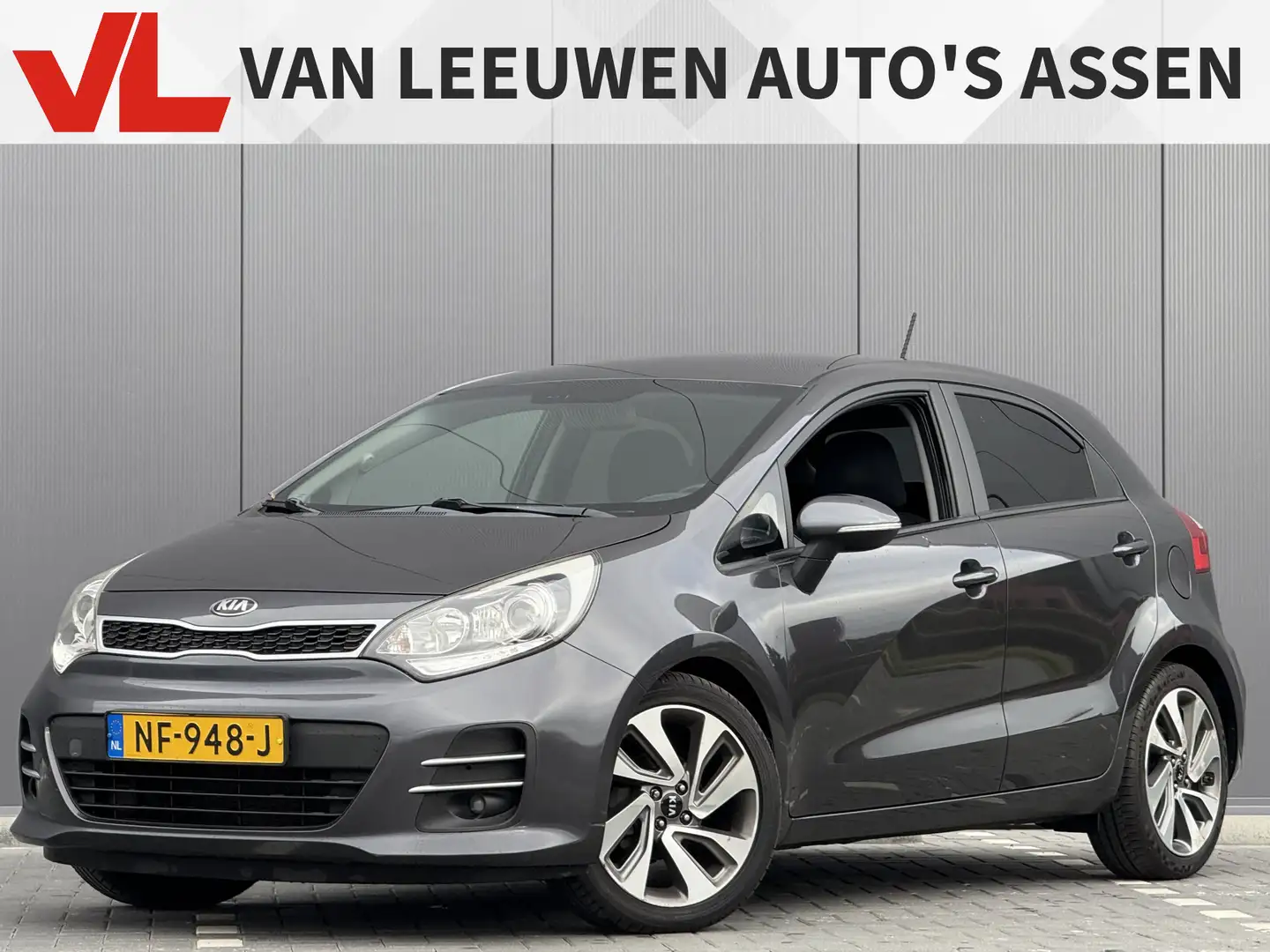 Kia Rio 1.2 CVVT ExecutiveLine | Rijklaar | Navi | PDC | Gris - 1