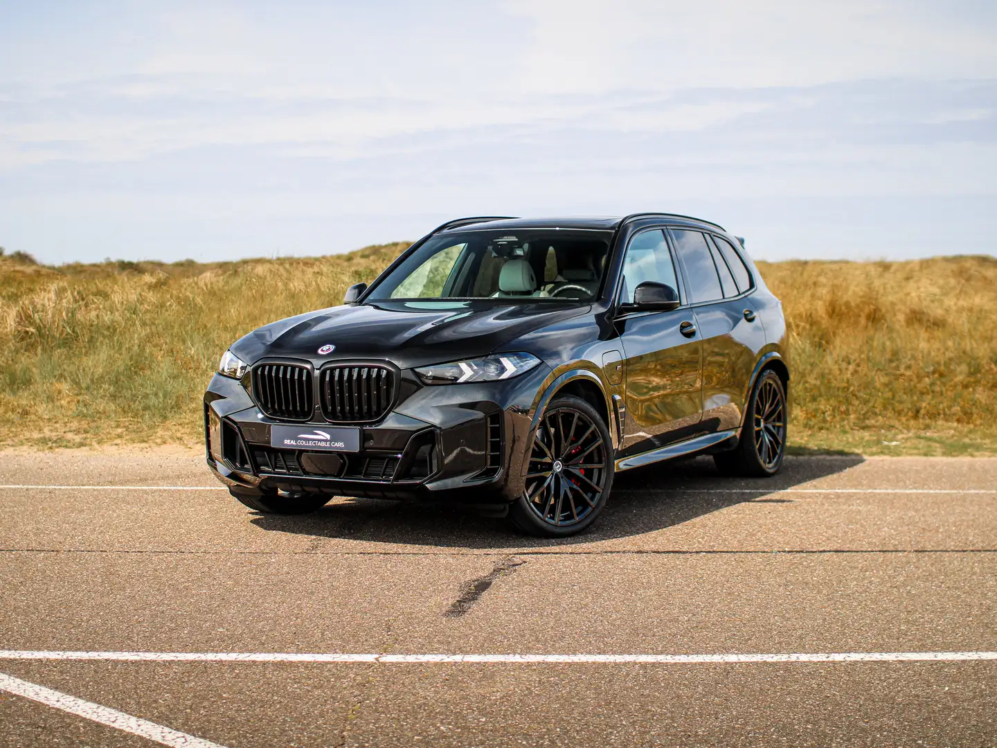 BMW X5 xDrive50e | Hybrid | Pano | Trekhaak | M Pro | LED Nero - 1