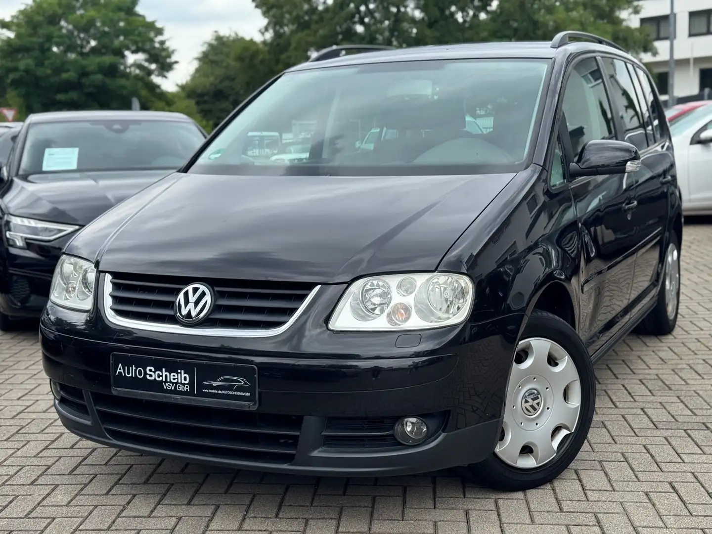 Volkswagen Touran *7-Sitzer*1.Hand*Klima*SHZ*Tempomat Noir - 1