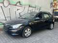 Hyundai i30 CW 1.4 Comfort Kombi *Klima+1.Hand+TÜV-NEU* Schwarz - thumbnail 1