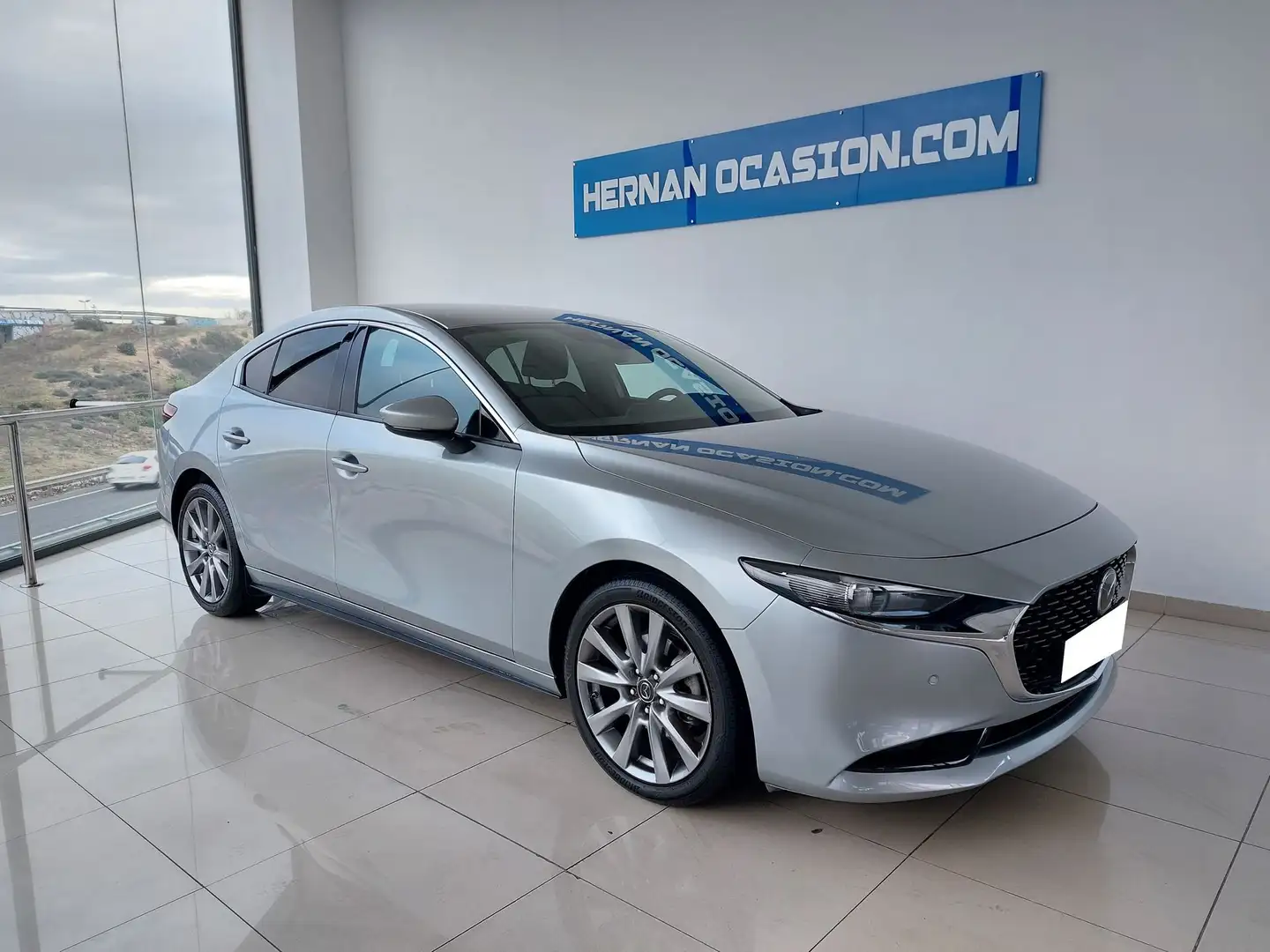 Mazda 3 Sedán 2.0 e-Skyactiv-G Zenith 90kW Gris - 1