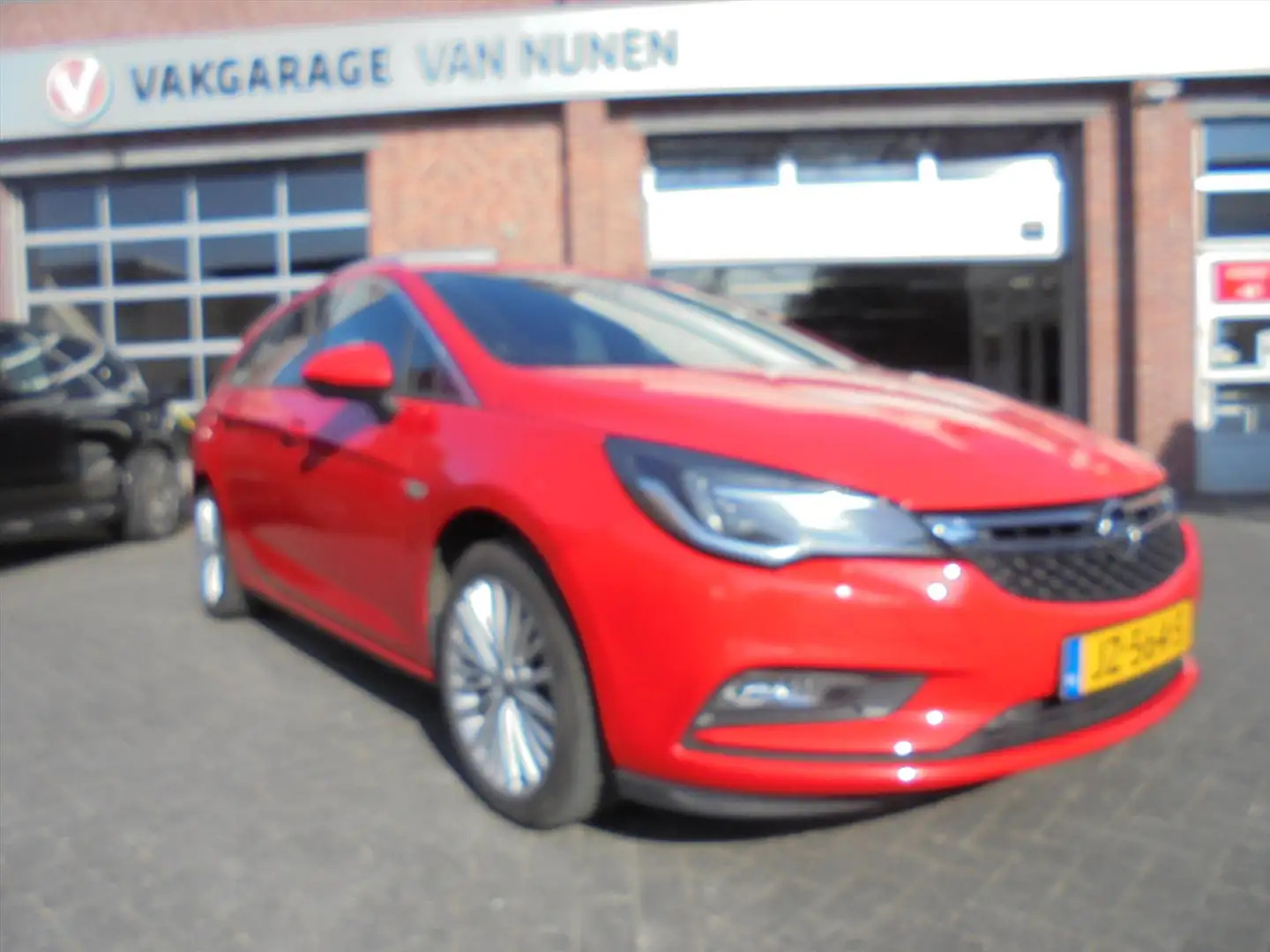Opel Astra 1.0 Turbo 105pk Start/Stop Innovation Rojo - 1
