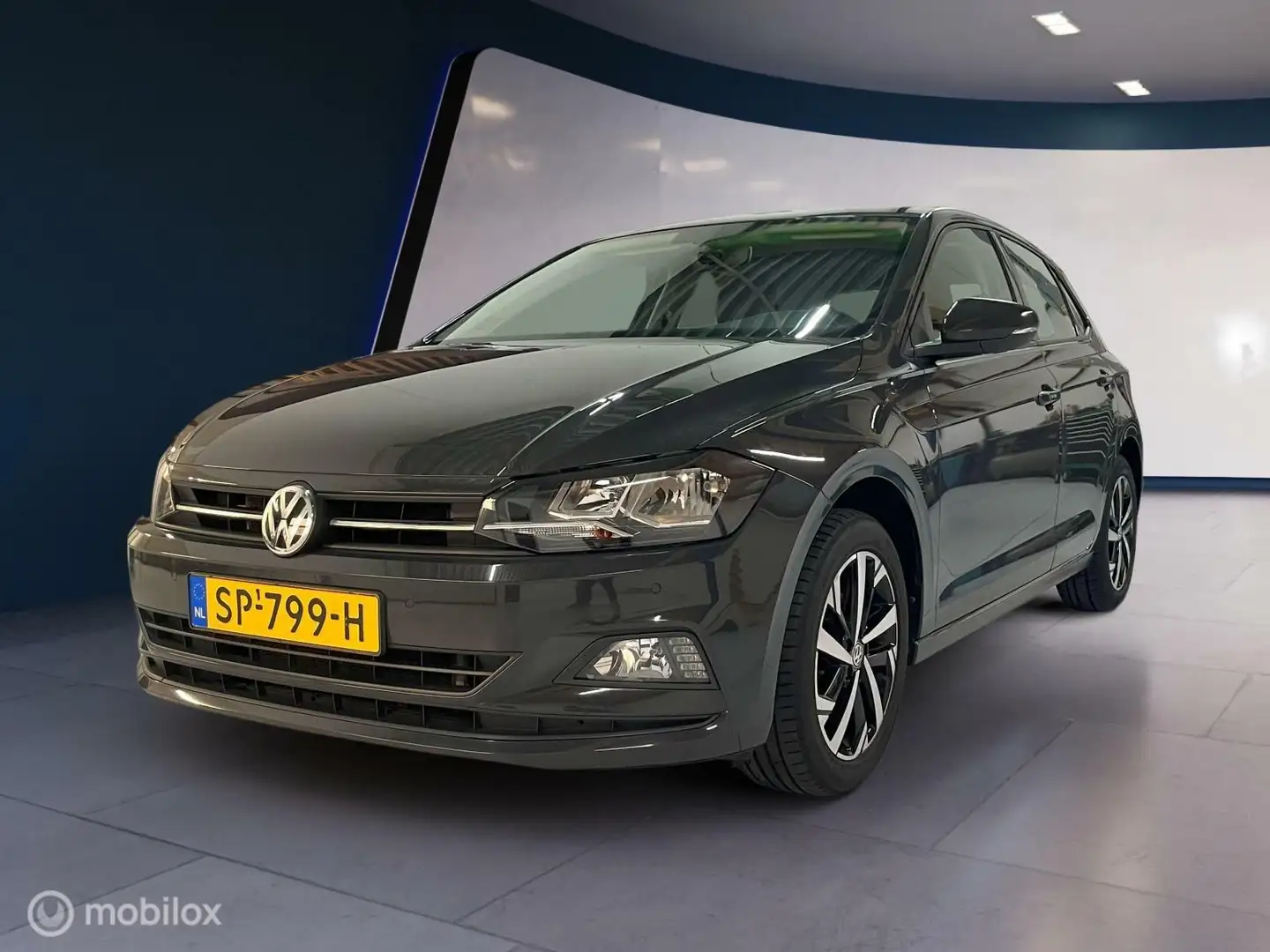 Volkswagen Polo 1.0 TSI 115pk✓PDC✓LM velg✓Cruise✓trekhaak Grijs - 1