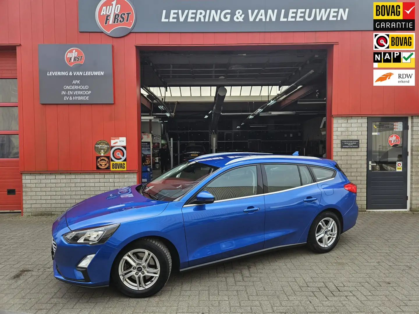 Ford Focus Wagon 1.0 EcoBoost Hybrid Trend Edition Business N Blauw - 1