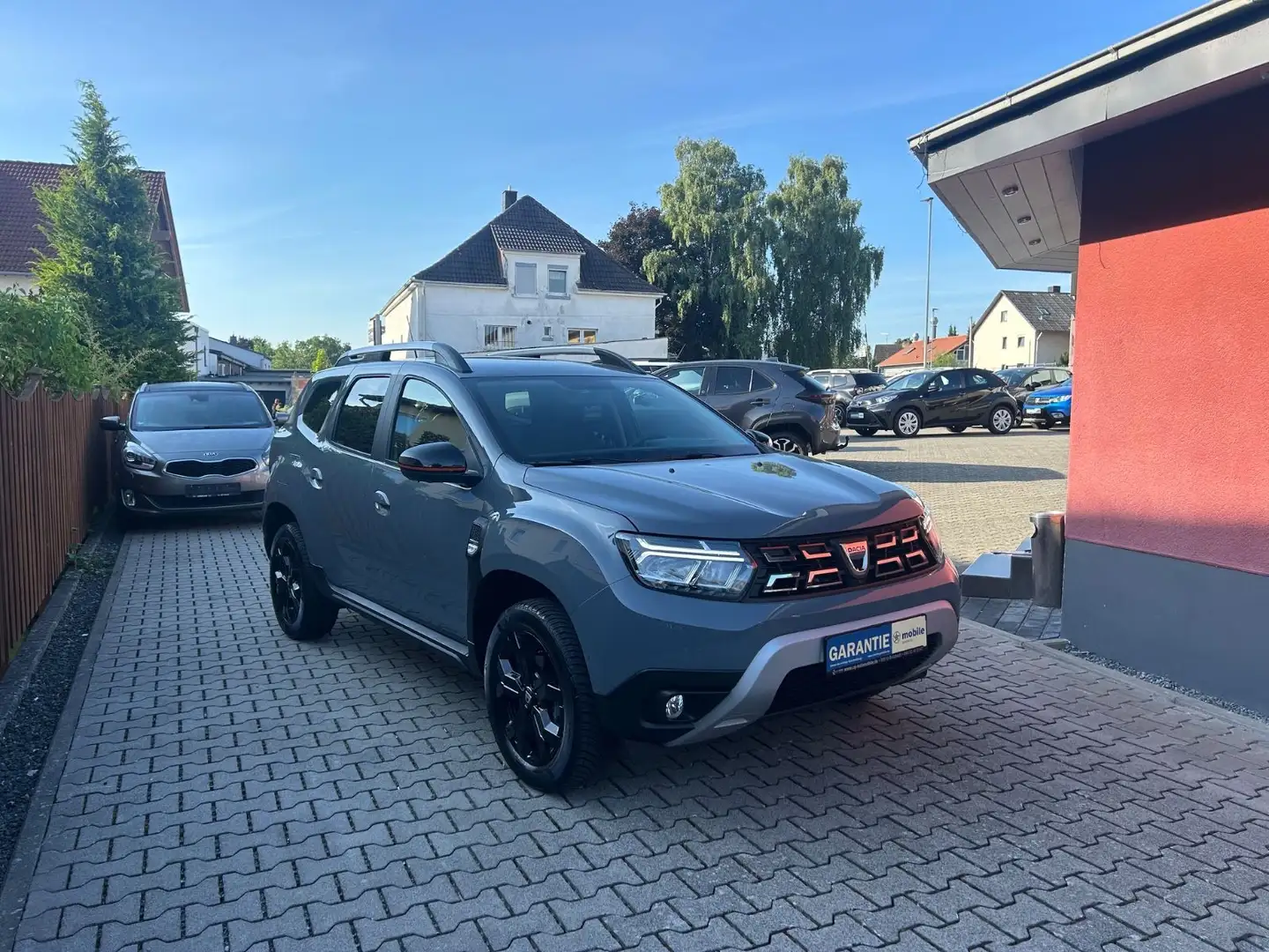 Dacia Duster TCe 150 Extreme Automatik Sorgefreipaket Grau - 1
