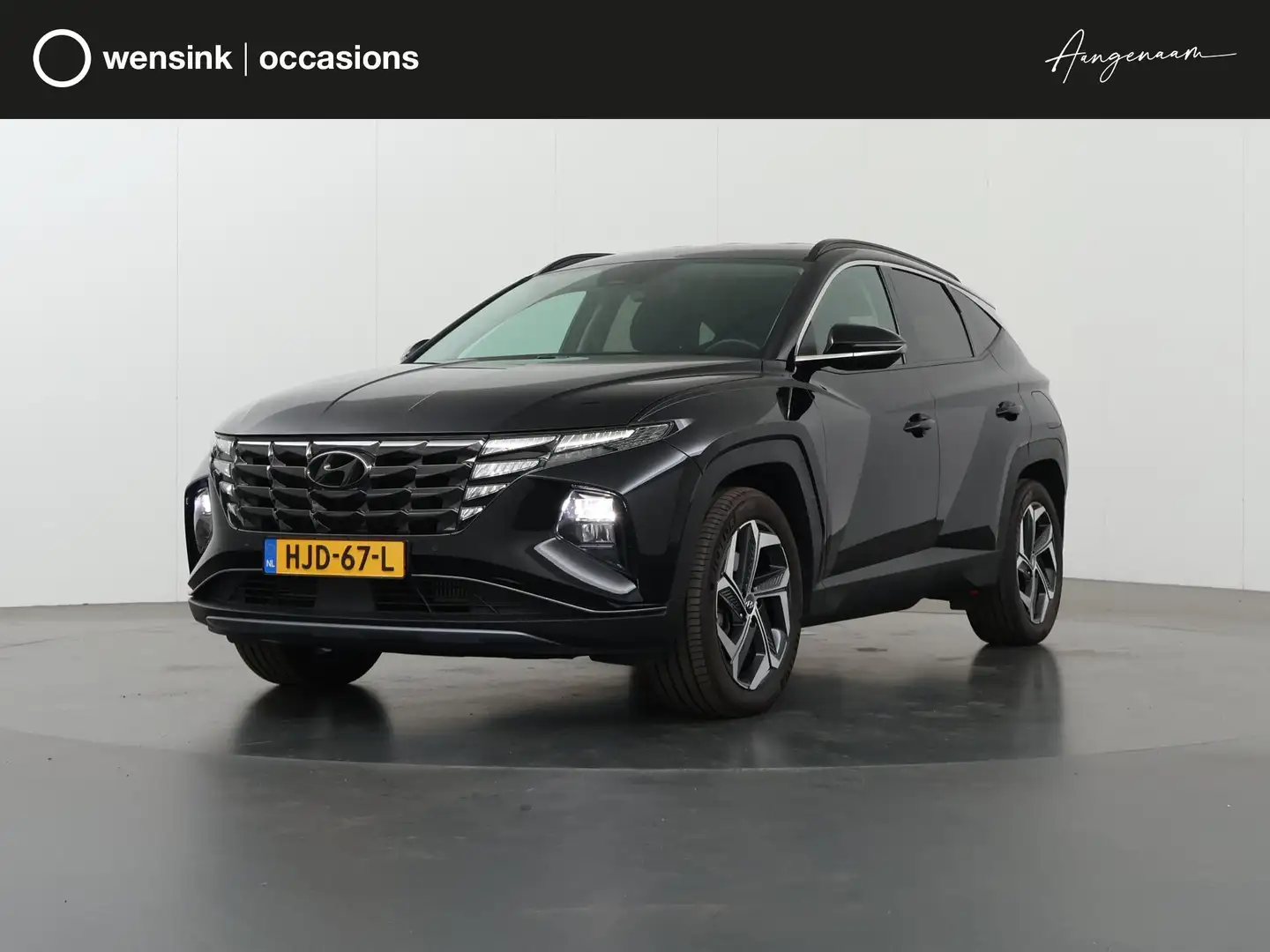 Hyundai TUCSON 1.6 T-GDI PHEV Comfort Smart 4WD | Navigatie | Cam Zwart - 1