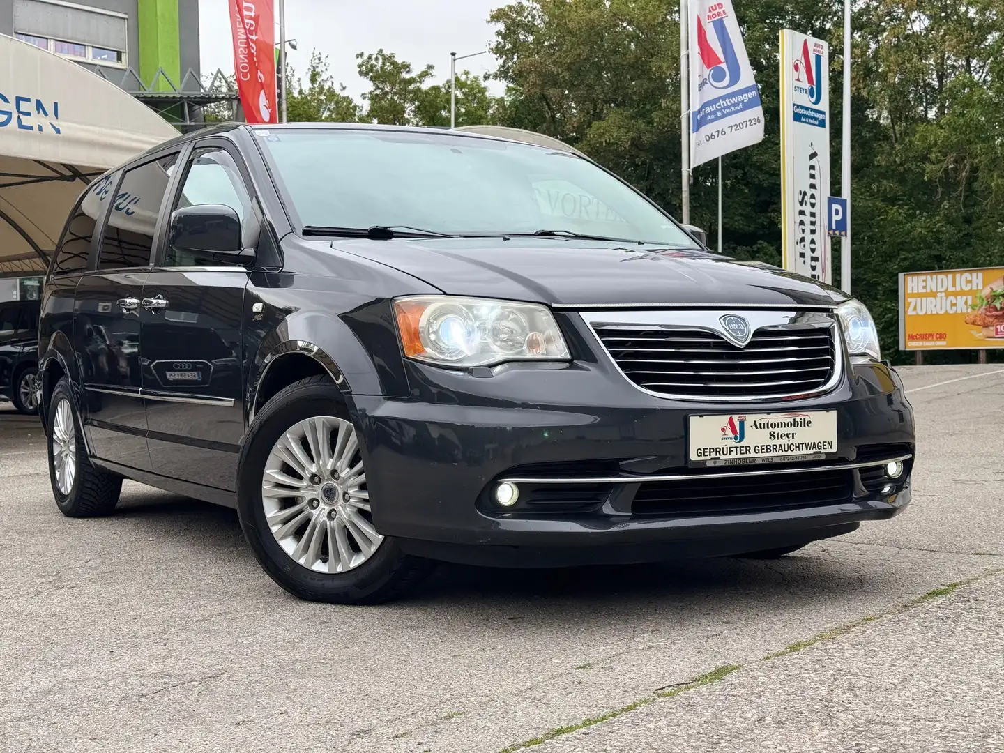 Lancia Voyager Gold Aut.+7 Sitze Navi+Kamera+Xenon+Leder+AHK Grau - 1