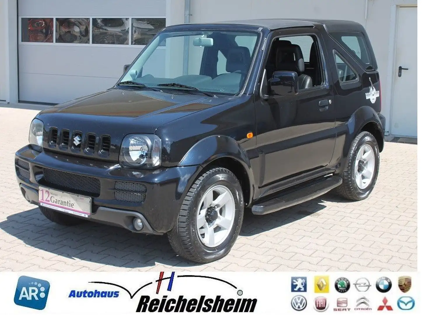 Suzuki Jimny Tüv neu,wenig Km,1 Hd.,Leder,Klima,Finanz Negro - 1