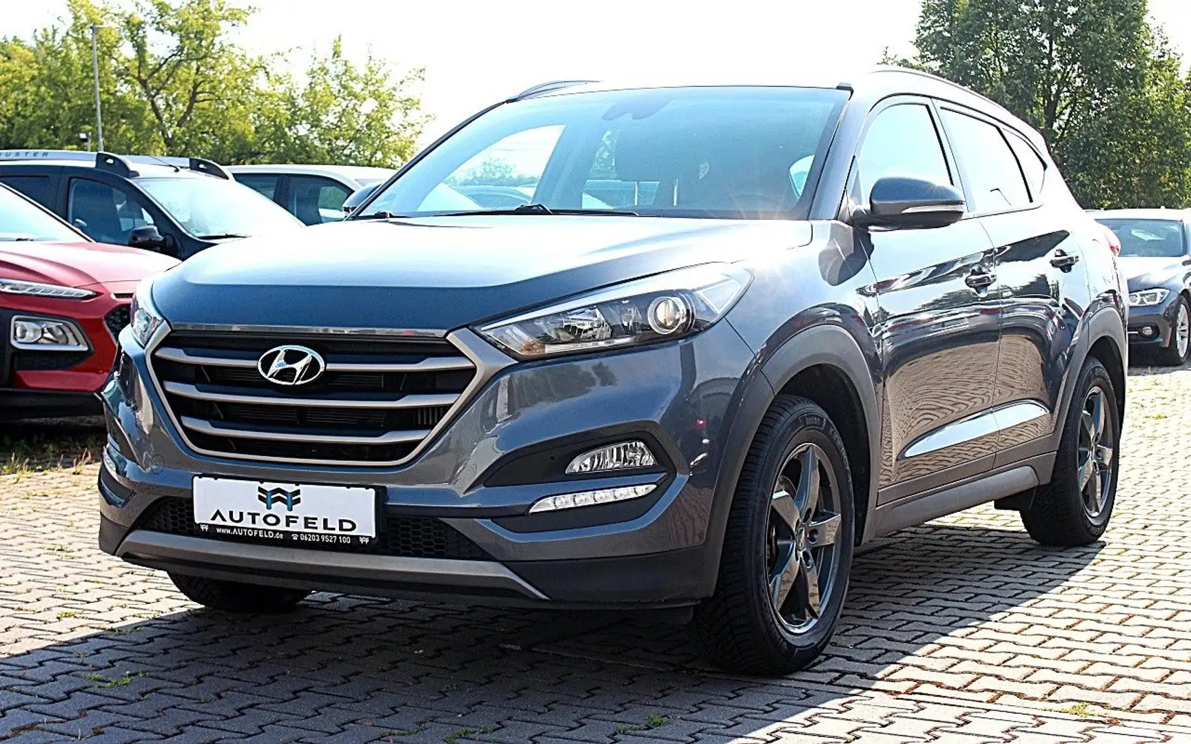 Hyundai TUCSON 1.6 TGDi 4WD INTRO/SHEFT/NAVI/RCAM/AHK/ Grau - 1