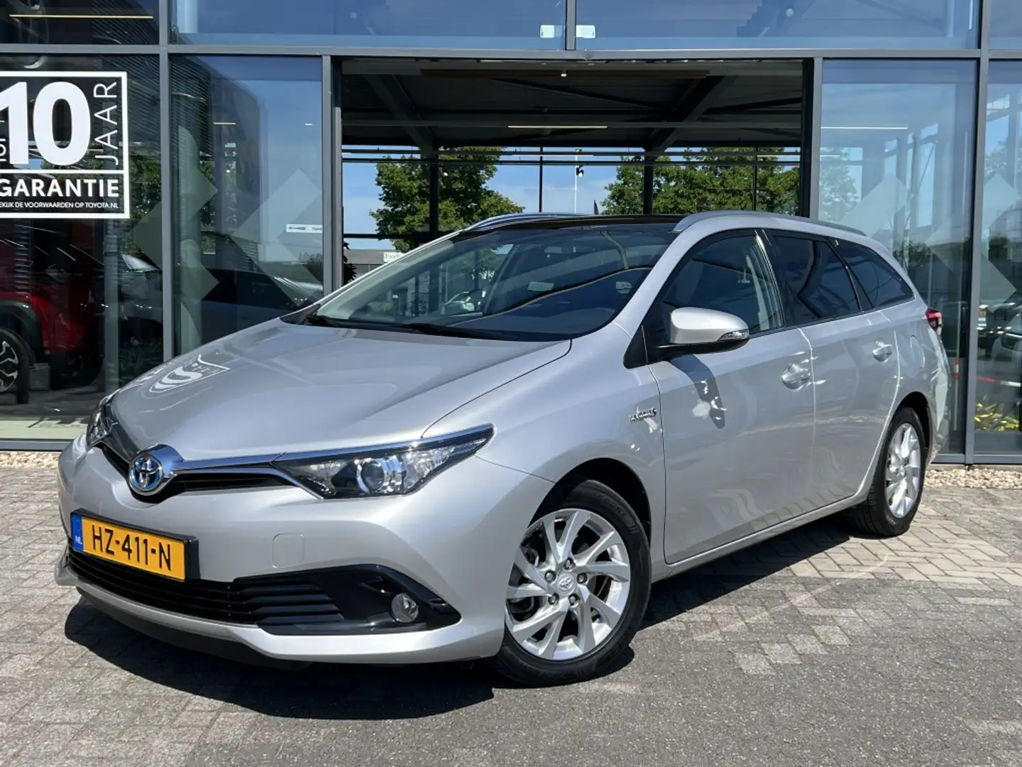 Toyota Auris Touring Sports 1.8 Hybr. Trend Gris - 1