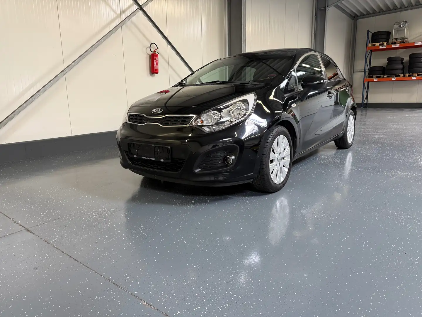 Kia Rio Kia Rio 1.4. (109 PS)EZ 12/2013/TÜV neu Noir - 1