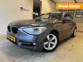 BMW 116 116i Upgrade Edition CLIMA LEER NAVI KEY-LESS NAP Grijs - thumbnail 1