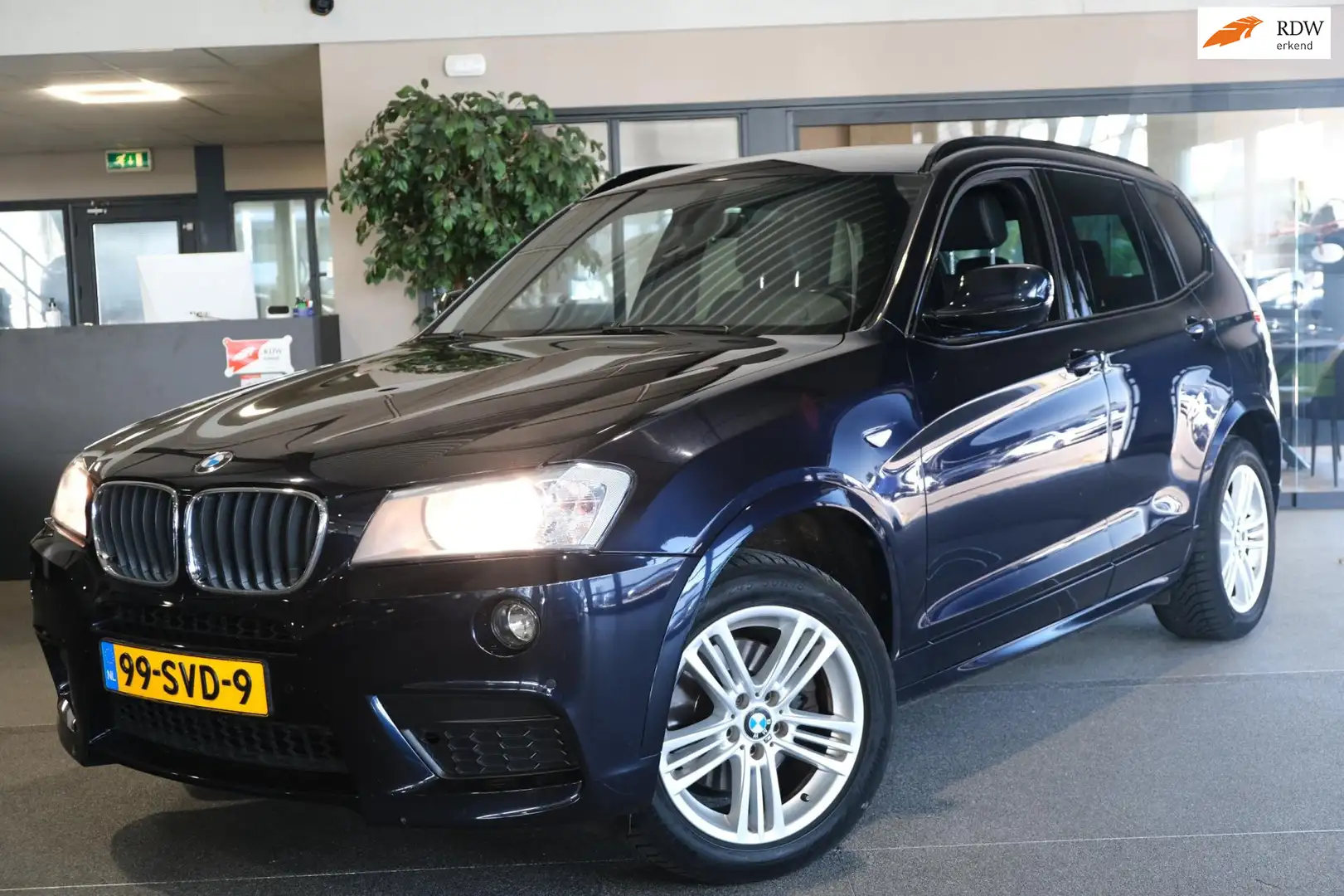 BMW X3 XDrive20i Executive M Pakket Navi Cruise PDC Trekh Zwart - 1