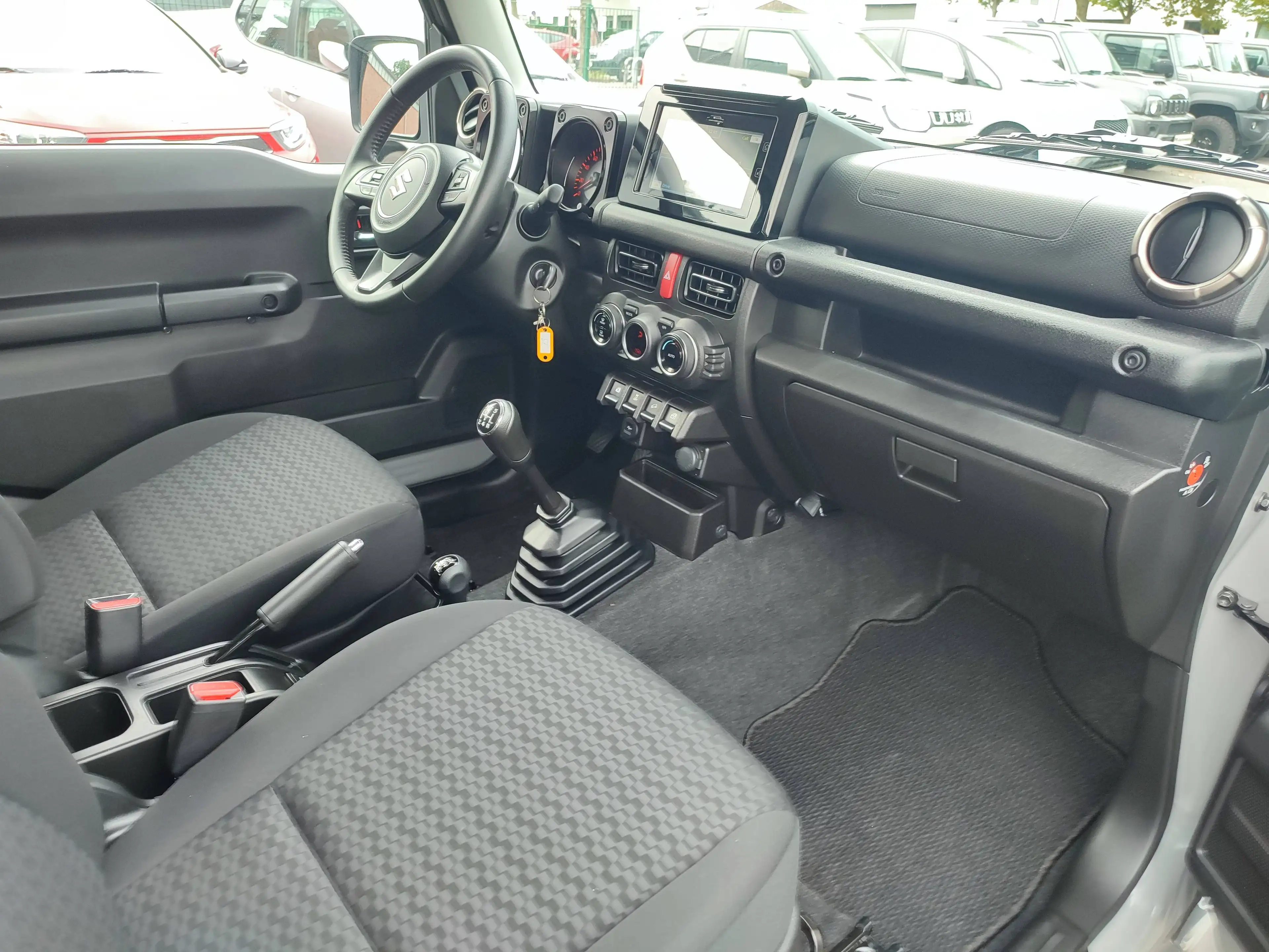 Suzuki Jimny Jimny 1.5 ALLGRIP Comfort + Klimaaut/Navi+Cam/AHK — photo 13