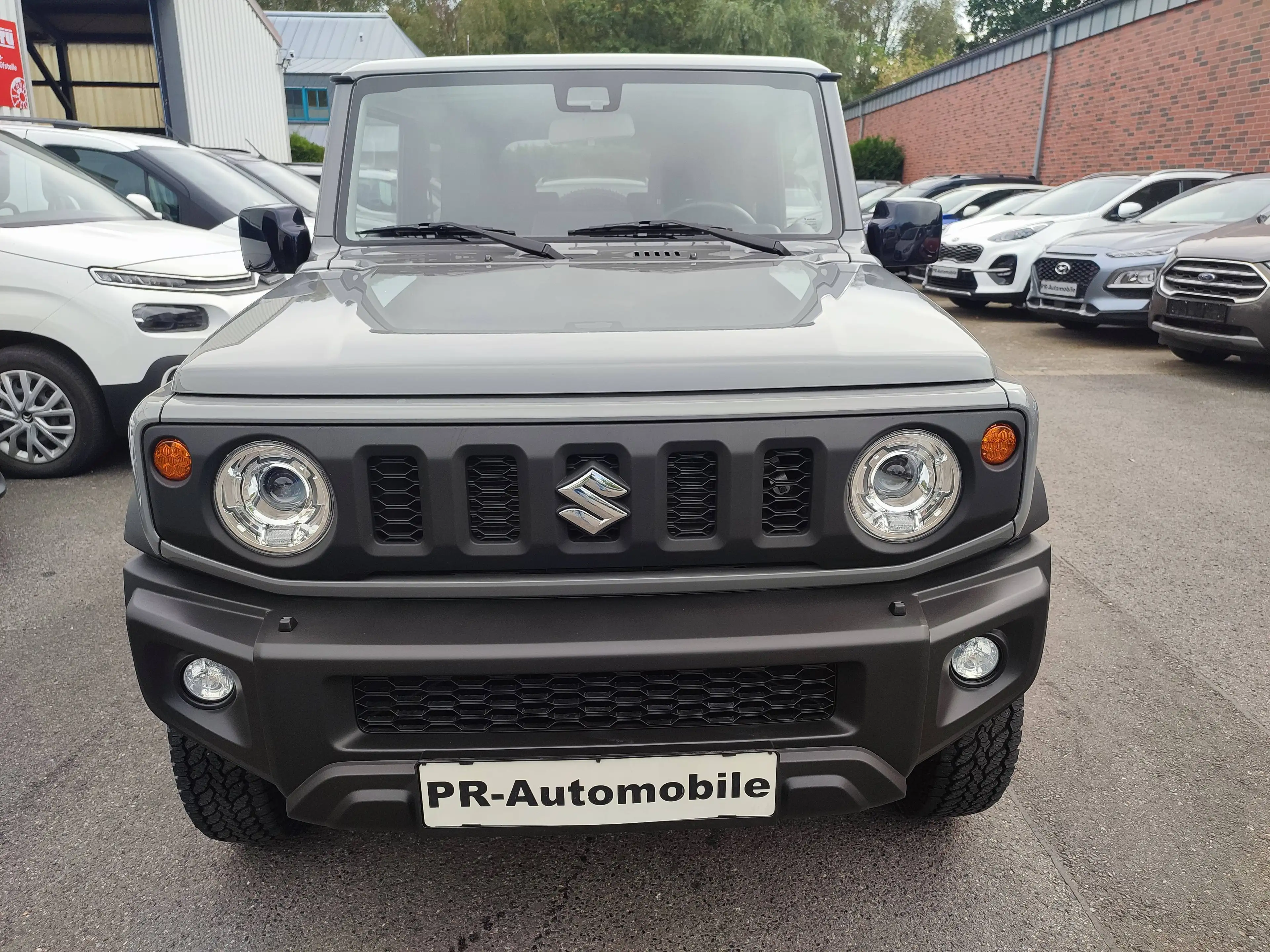 Suzuki Jimny Jimny 1.5 ALLGRIP Comfort + Klimaaut/Navi+Cam/AHK — photo 2