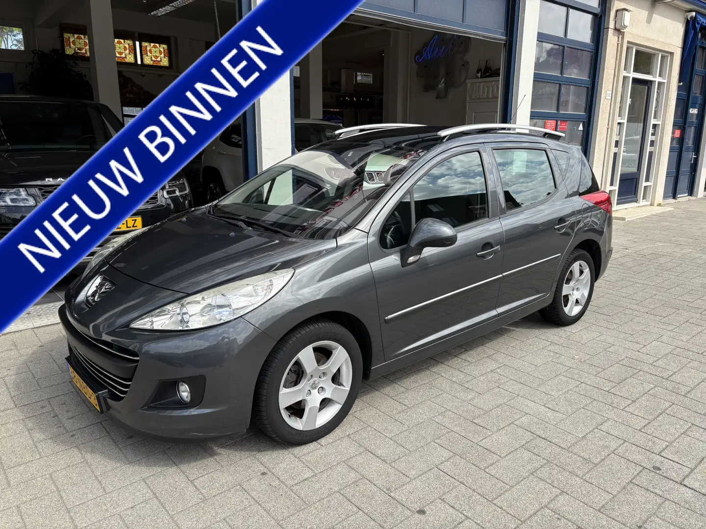 Peugeot 207 SW 1.6 VTi XS PANO/CLIMA/CRUISE/DEALER OND. Grijs - 1