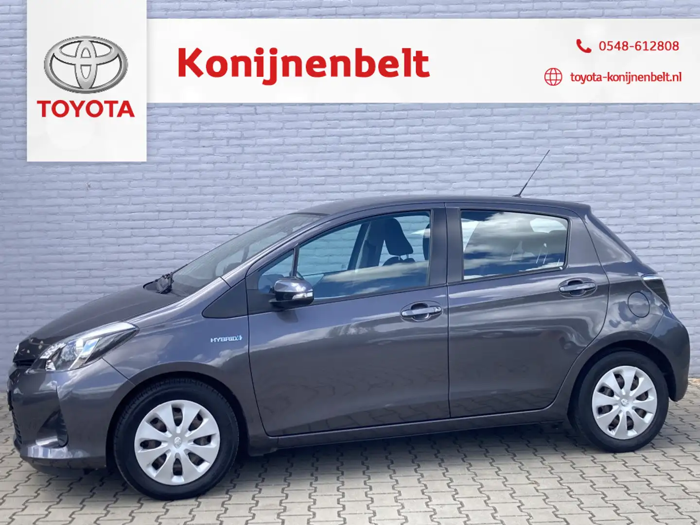 Toyota Yaris 1.5 Hybrid Comfort Automaat 5-deurs | Navi | Trekh Grijs - 1