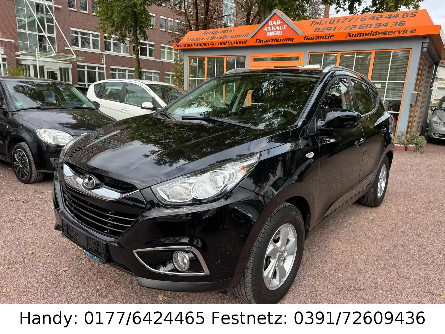 Hyundai iX35 1.6 GDI 2WD 1.HAND/KLIMA/4xel.FH/ALU Schwarz - 1