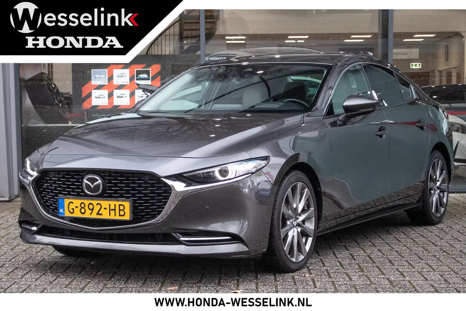 Mazda 3 2.0 e-SkyActiv-X M Hybrid 180 Luxury - Leder | Nav Grijs - 1