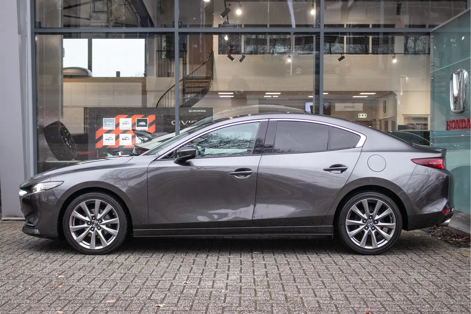 Mazda 3 2.0 e-SkyActiv-X M Hybrid 180 Luxury - Leder | Nav Grijs - 2