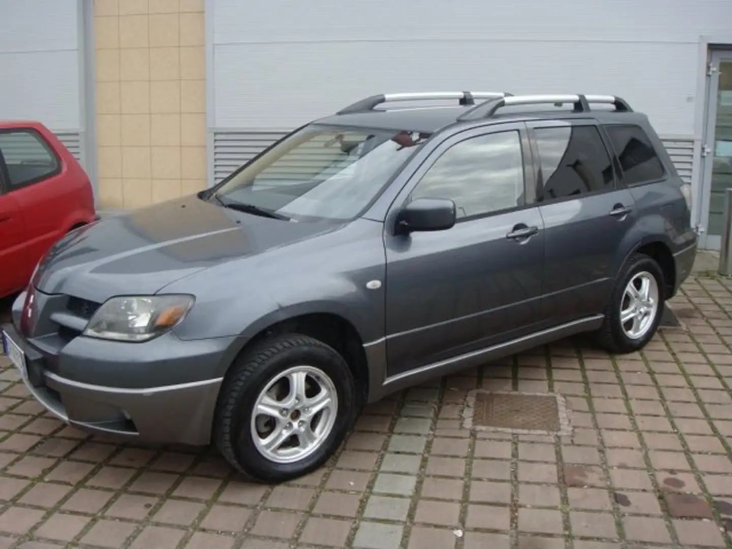 Mitsubishi Outlander 2.0 i 4WD !! IMP. A METANO !! Grigio - 1