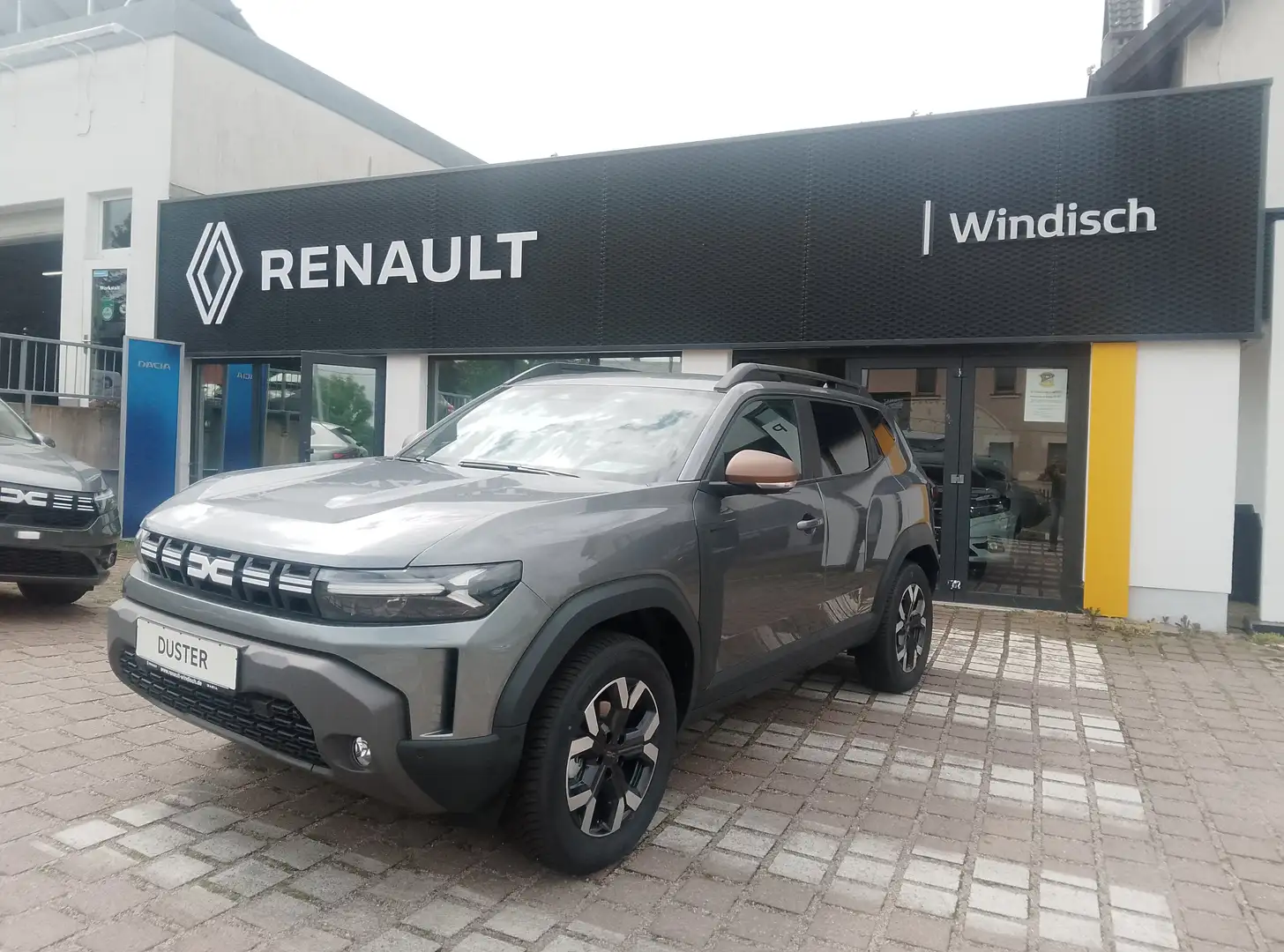 Dacia Duster Extreme TCe 130 4x4, PDC-CAM, SHZ, Klima, Bluetooh Grau - 1