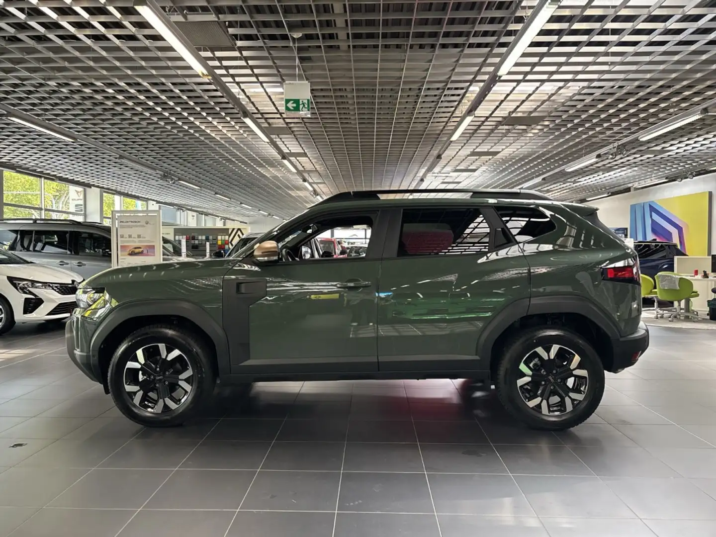 Dacia Duster III TCe 130 Extreme 4x4 mit AHK Klima Navi Grün - 2