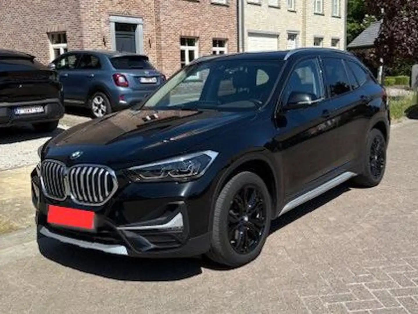 BMW X1 X1 sDrive18i Aut. xLine + NIEUWE SET WINTERBANDEN Noir - 1