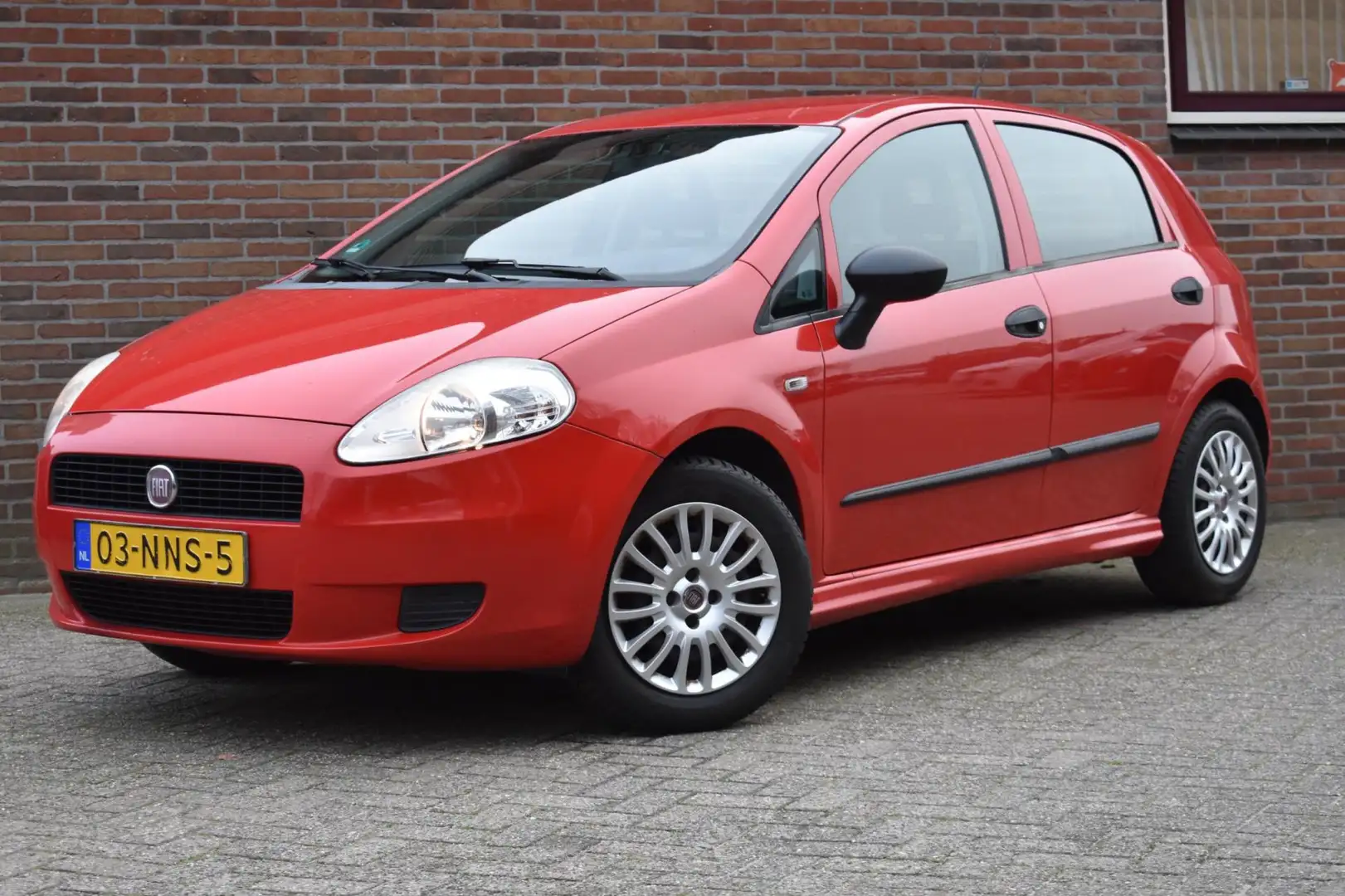 Fiat Grande Punto 1.3 M-Jet Actual '10 ZO MEE Rood - 1