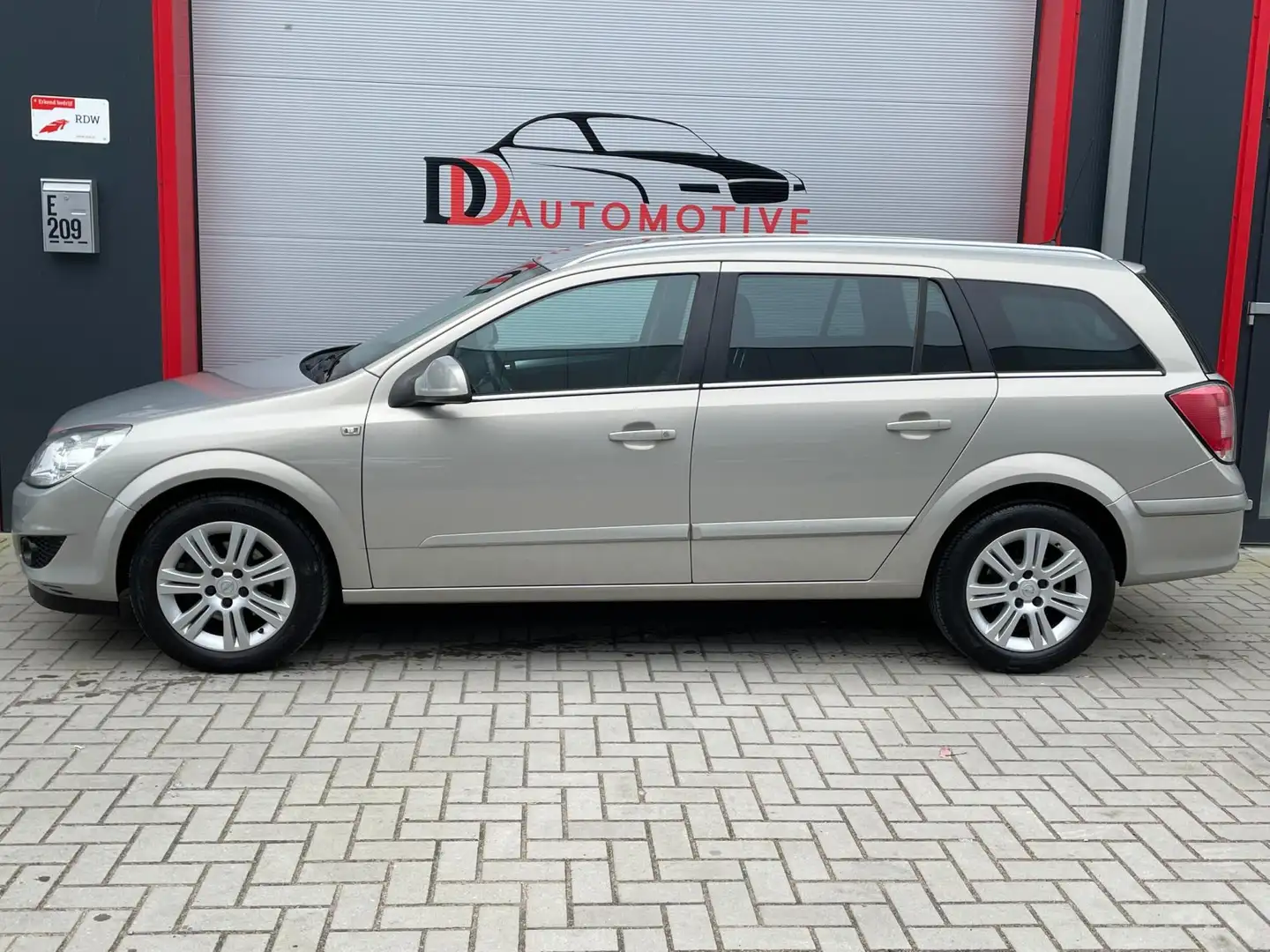 Opel Astra Wagon 1.6 Cosmo LEER/NAV/PDC/CRUISE/CLIMA/NAP/ORGN Beige - 2