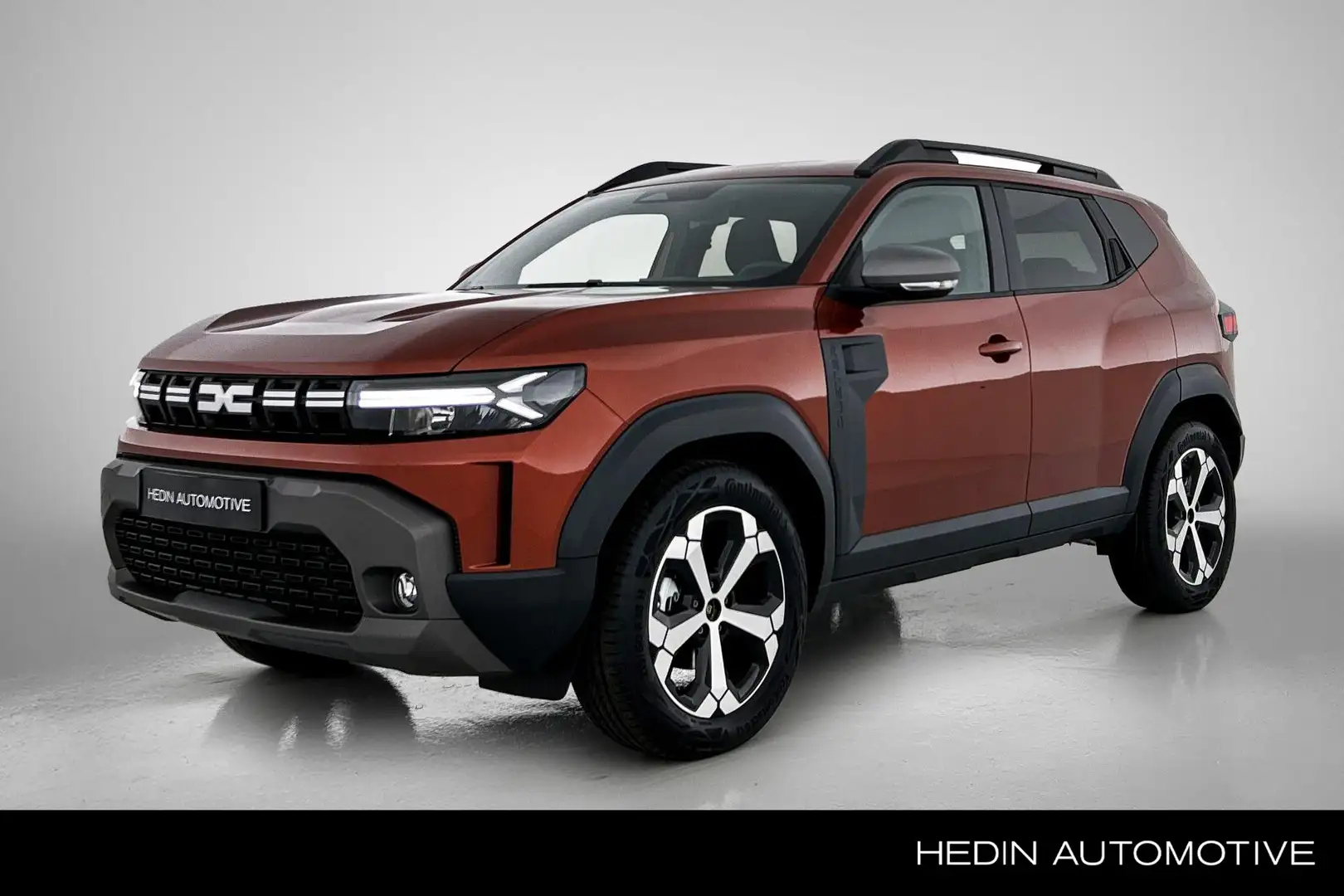 Dacia Duster 1.6 Hybrid 140 Journey | Pack winter | Duster staa Bruin - 1